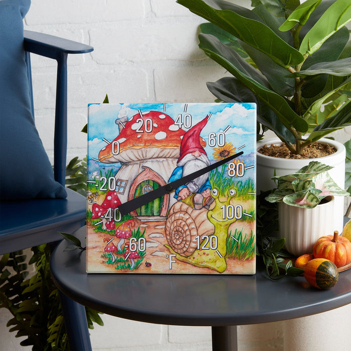 Colorful box for the 8x8 inch gnome garden ceramic tabletop thermometer with illustrated whimsical scene