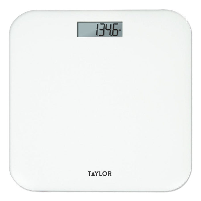 White pillow shaped digital scale with display reading 134.6 lb and Taylor branding