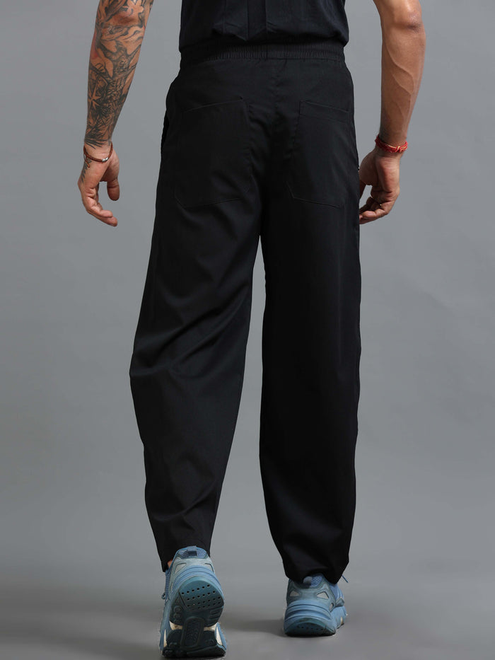 Black Relaxed Fit Trousers for Men detail view - Flowstate Relaxed Trouser by Italian Colony