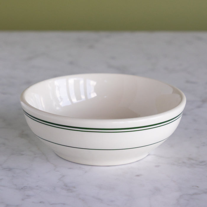 A white porcelain 14-ounce bowl featuring classic green stripes around the upper rim.