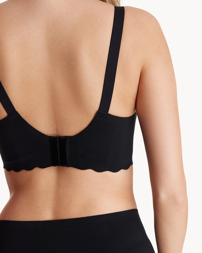 Woman's back modeling black Jelly Strip Nursing Bra YN46 with adjustable straps & hook-and-eye for M9 Pump comfort.