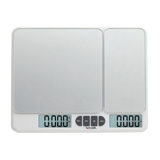 Close up of a white 11 lb dual platform kitchen scale with two large rectangular weighing surfaces and a digital display