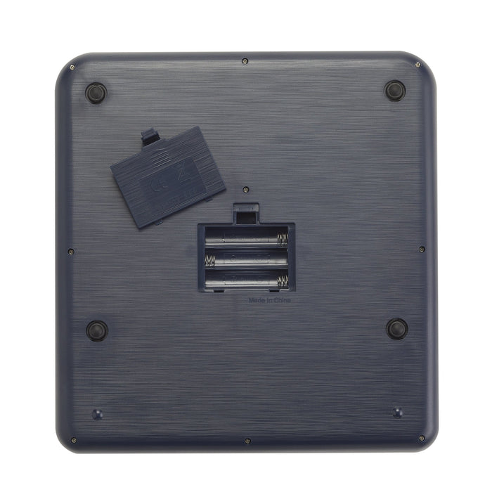 Back view of the scale with the battery compartment open and the cover detached