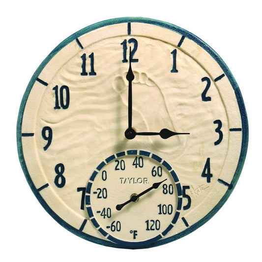Close-up of a 14 inch beige coastal clock with bold numerals and a built-in thermometer at the bottom
