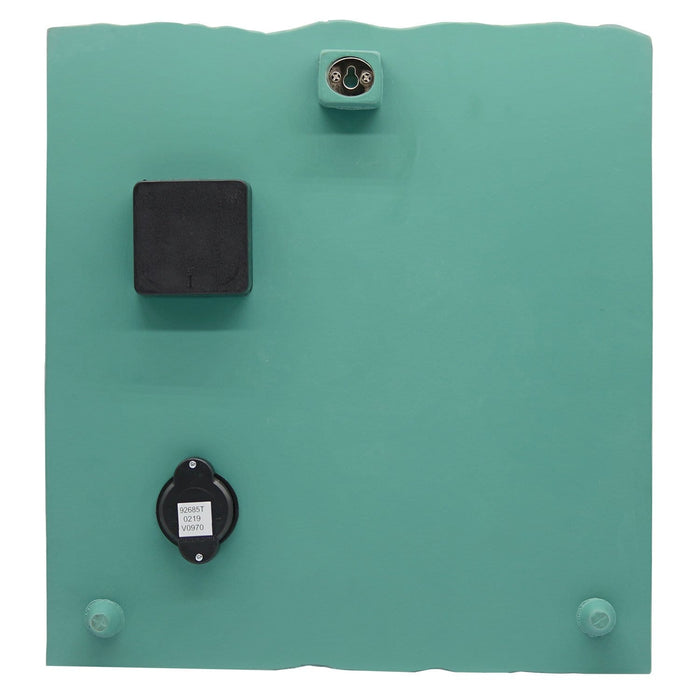 Back view of teal clock showing mounting bracket and circular dial with label