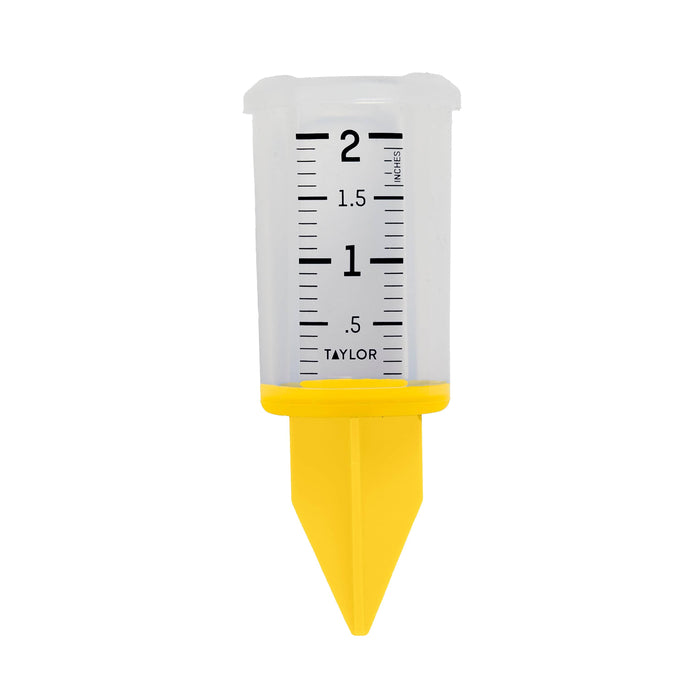 Yellow 2 inch silicone sprinkler gauge with white body and black markings held upright.