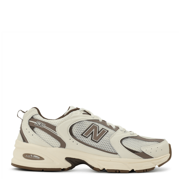White and brown sneaker with New Balance logo on a white background