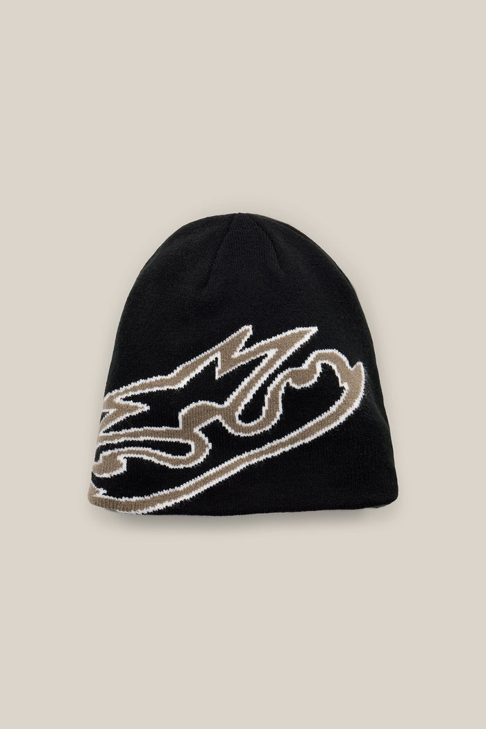 The 686 Jib Skully Beanie by 686 is a black acrylic knit beanie showcasing a bold, stylized beige and white graphic design on the front, set against a light beige background.
