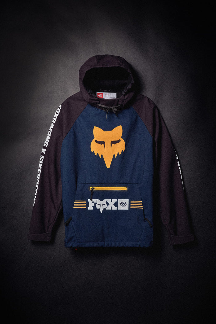 686 Men’s Fox Racing Waterproof Hoody featuring a large fox head logo on the chest and a front zippered pouch.
