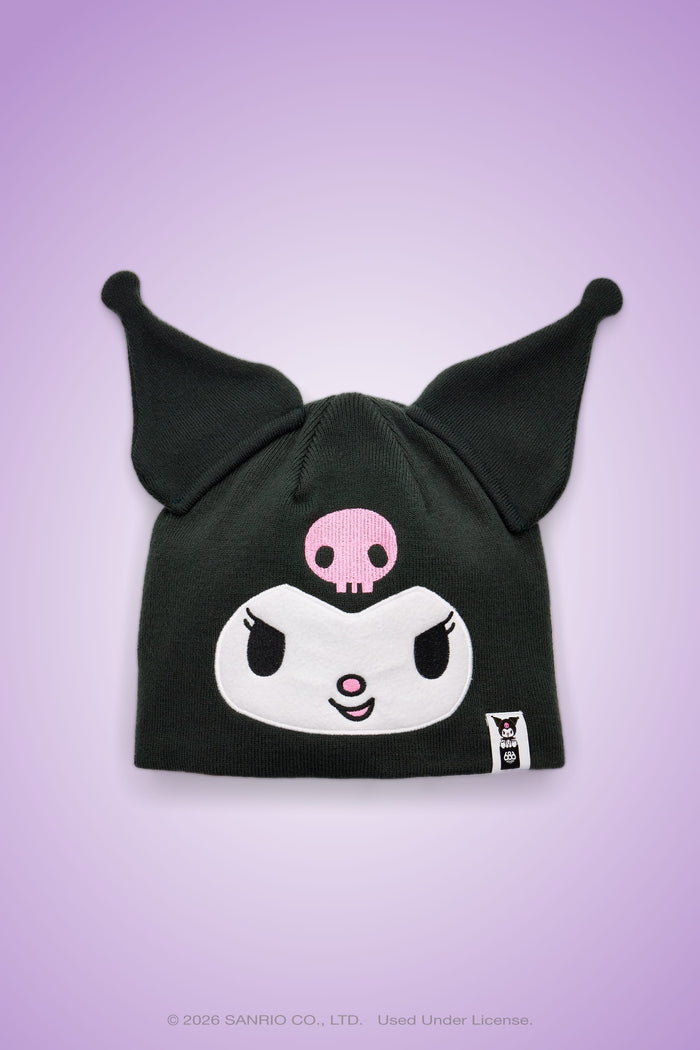 Introducing the 686 Women’s Kuromi™ Beanie by 686—a black acrylic knit beanie designed with playful, pointed ear-like tips and an embroidered cartoon face featuring Kuromi’s signature pink skull, expressive white eyes, and a mischievous smile. Set against a purple gradient background, this cozy accessory blends whimsical character style with everyday comfort to add a unique touch to any outfit.