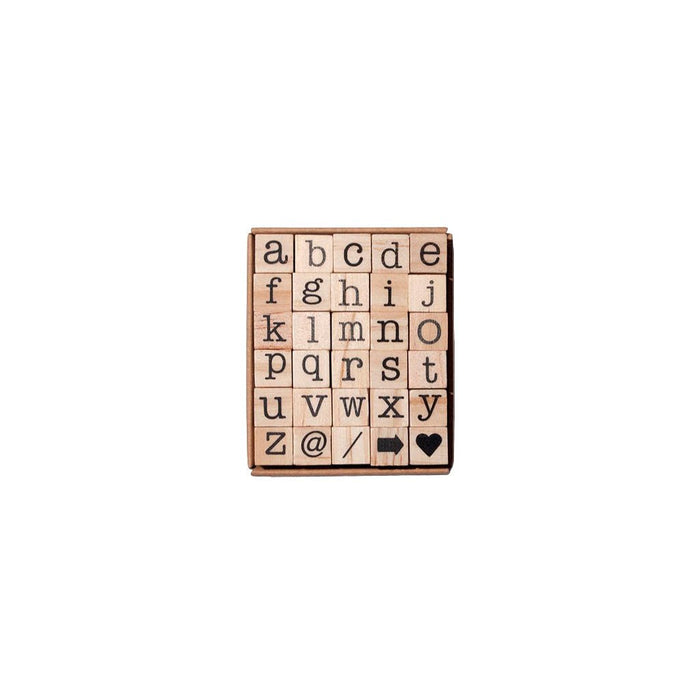 Set of 30 wooden stamps with lowercase letters and symbols in packaging on white background