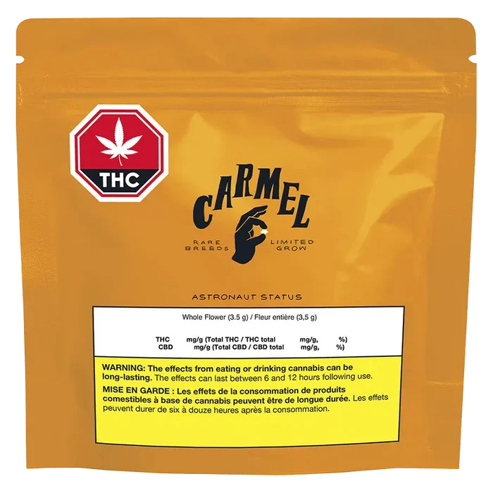 Front view of the gold pouch labeled "Carmel Astronaut Status" with a red THC symbol and a white nutrition box near the bottom.
