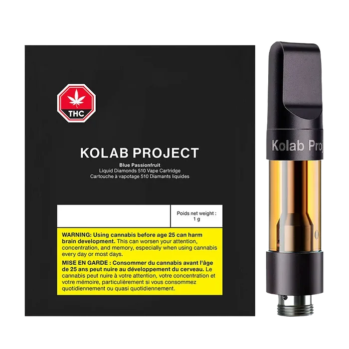 Right-side view of the Blue Passionfruit Diamonds Vape Cartridge by Kolab Project next to its black packaging showing a THC symbol and yellow warning panel.