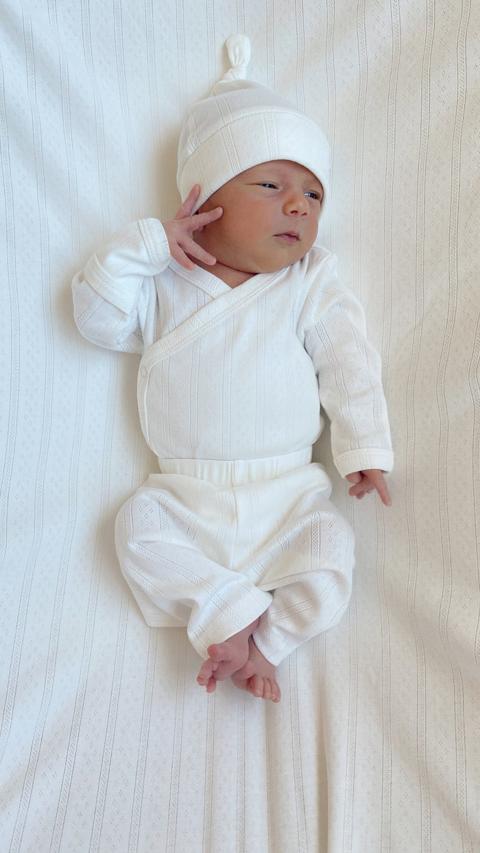 Newborn in the Cloud kimono bodysuit and knotted beanie