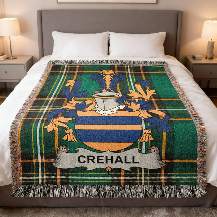 Crehall Irish family crest woven cotton blanket displayed on a bed