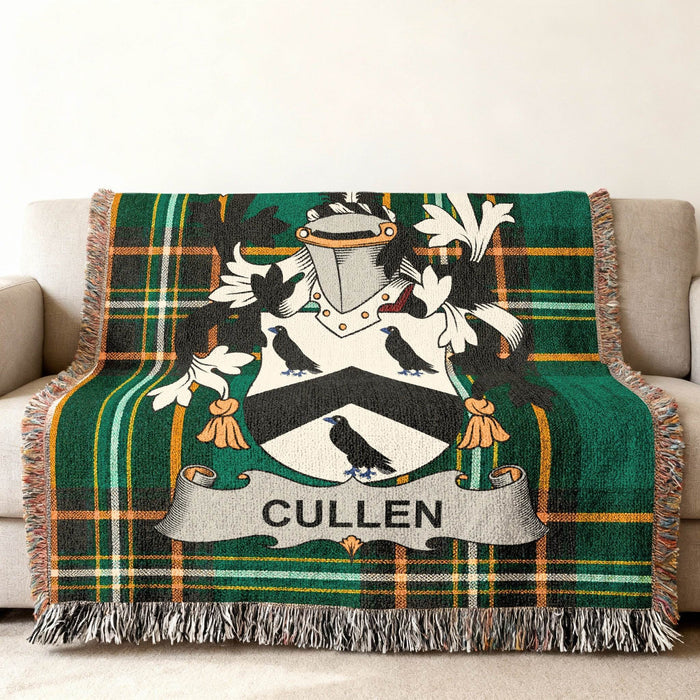 Cullen crest woven through an Irish National Tartan cotton throw.