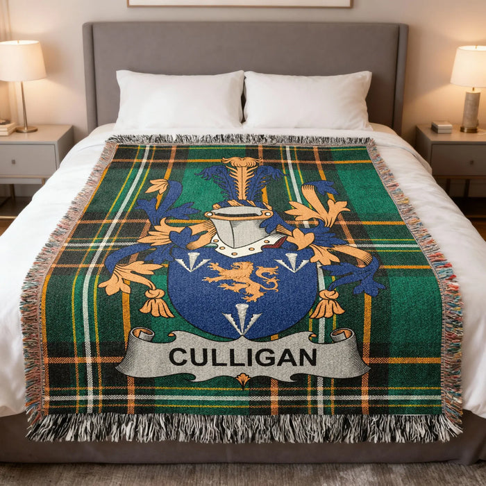 Culligan family crest woven blanket spread across a bed.