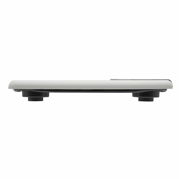 Side view of a white textured digital bathroom scale