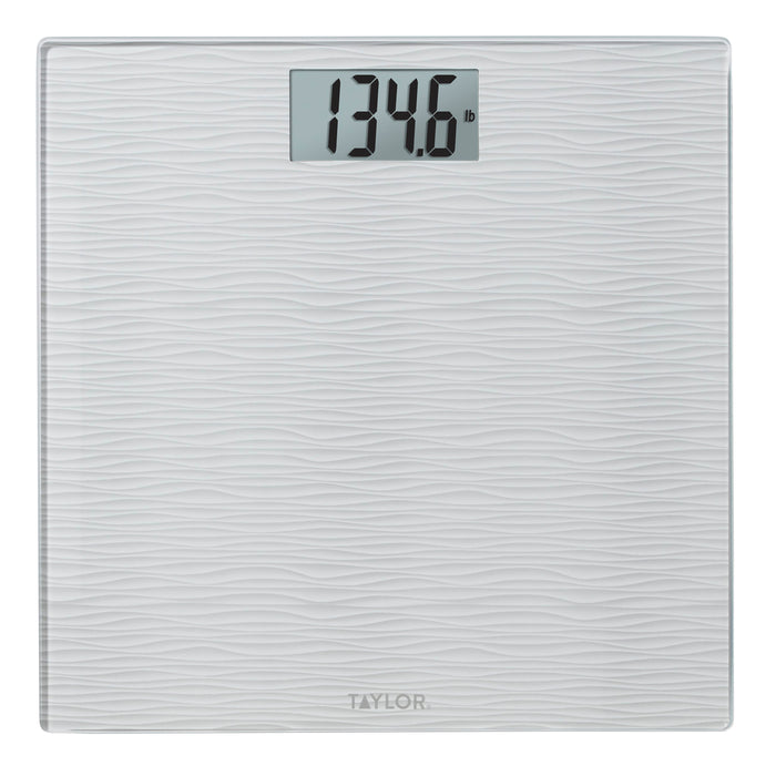 White digital bathroom scale with a textured wave pattern and a central display reading 139.6 lb