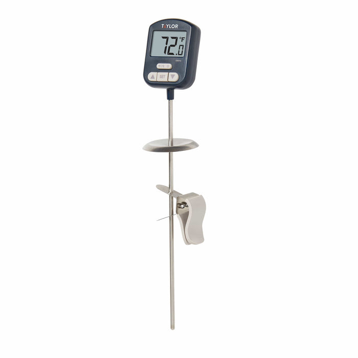 Taylor digital candy thermometer mounted on a metal stand with long probe and white locking clamp against white background