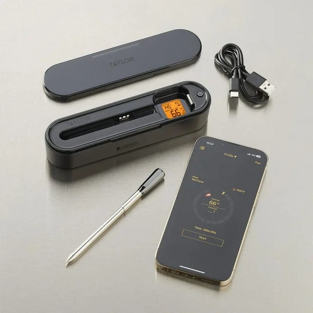 Digital Wireless App Thermometer kit with protective case, probe, USB cable, and a smartphone screen displaying the thermometer app