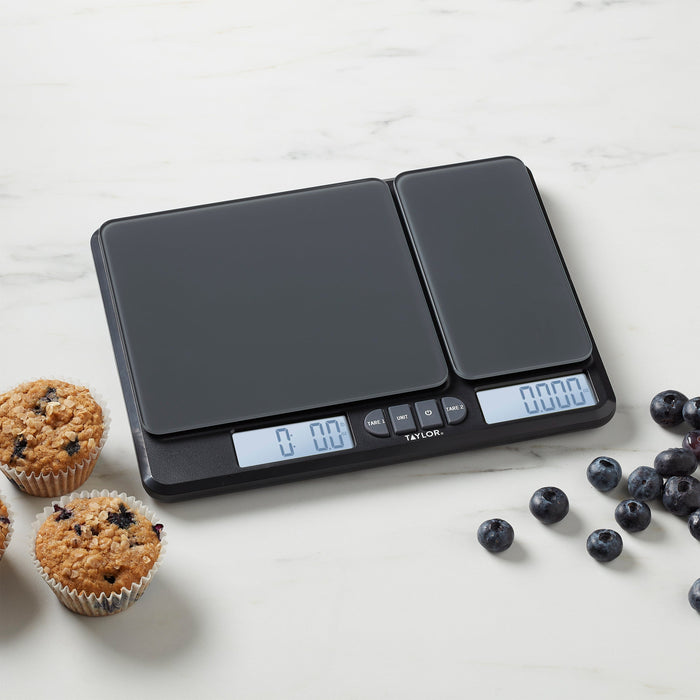 Taylor Dual Platform Kitchen Scale on a white marble surface with muffins and blueberries nearby