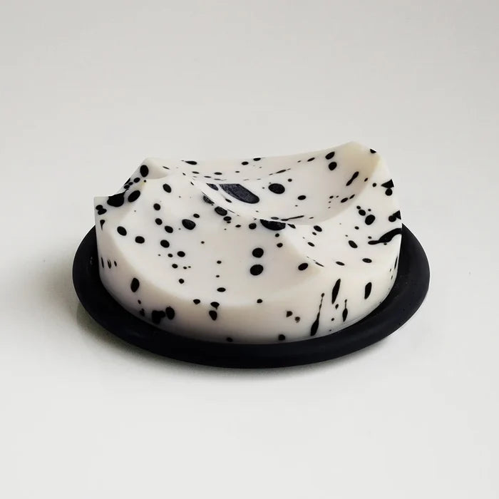 The sculptural bar, cream with black flecks