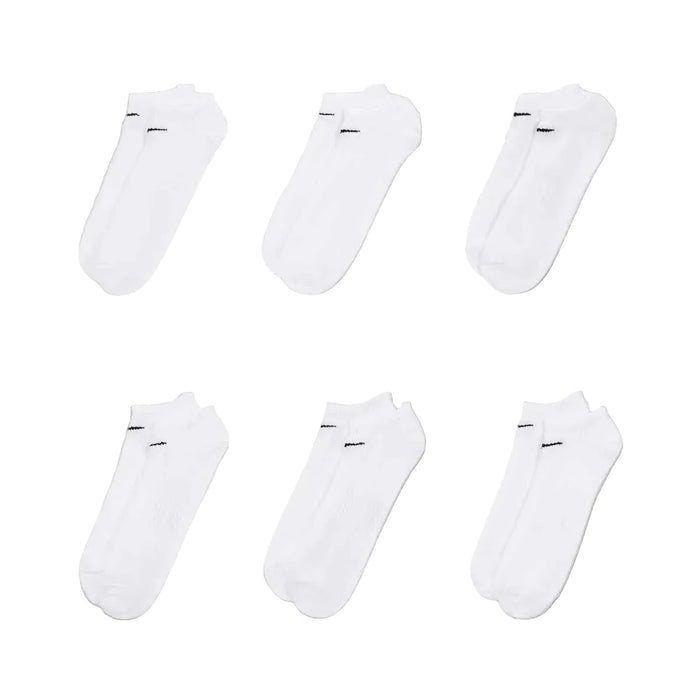 Set of six white ankle socks on a white background