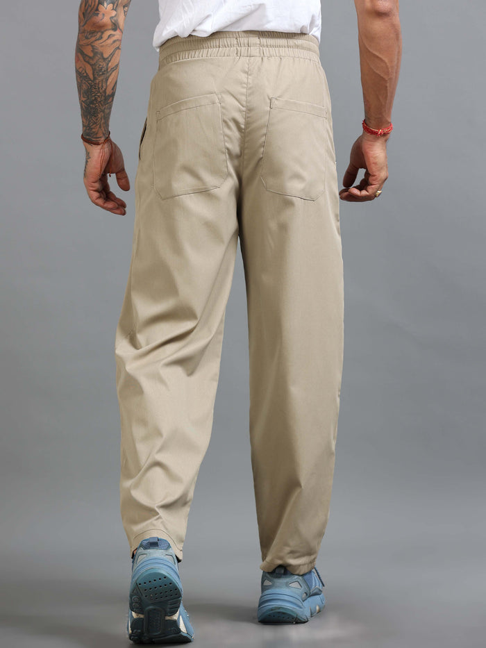 Beige Relaxed Fit Trousers for Men detail view - Flowstate Relaxed Trouser by Italian Colony