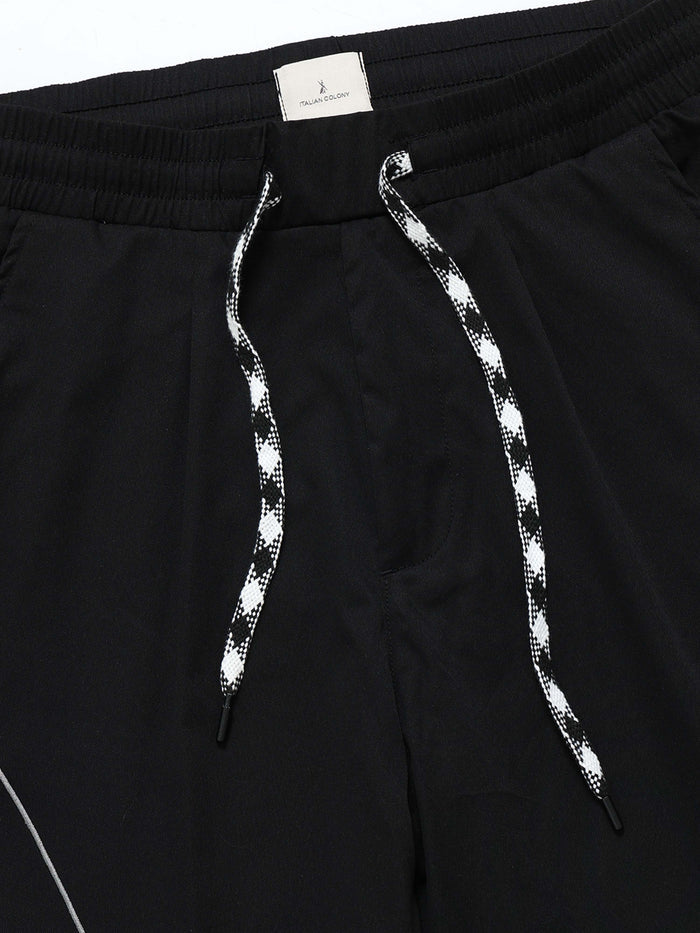 Black Relaxed Fit Trousers for Men detail view - Flowstate Relaxed Trouser by Italian Colony