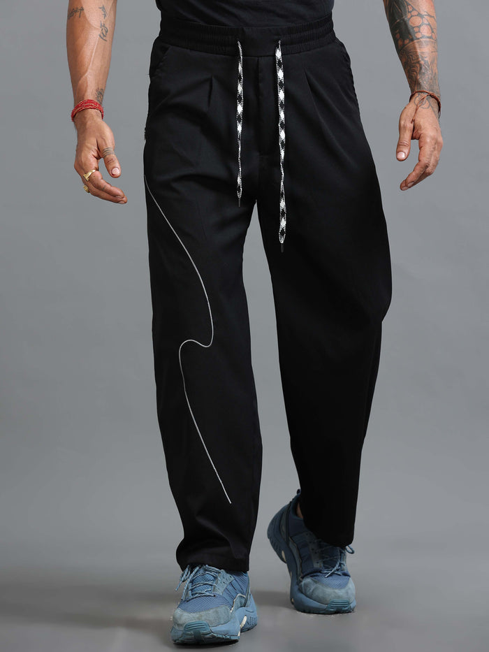 Black Relaxed Fit Trousers for Men detail view - Flowstate Relaxed Trouser by Italian Colony