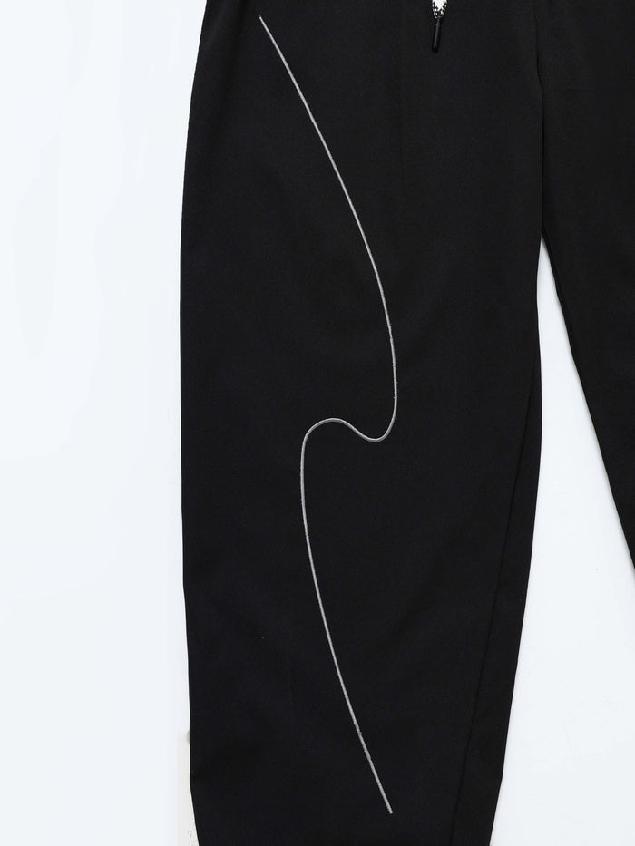 Black Relaxed Fit Trousers for Men detail view - Flowstate Relaxed Trouser by Italian Colony