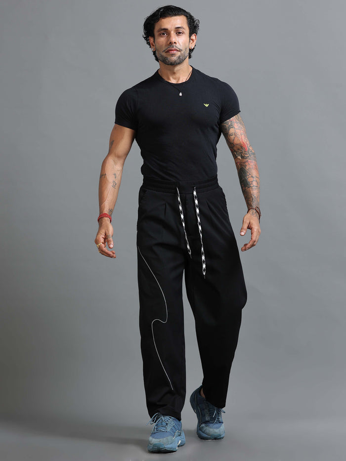 Black Relaxed Fit Trousers for Men detail view - Flowstate Relaxed Trouser by Italian Colony
