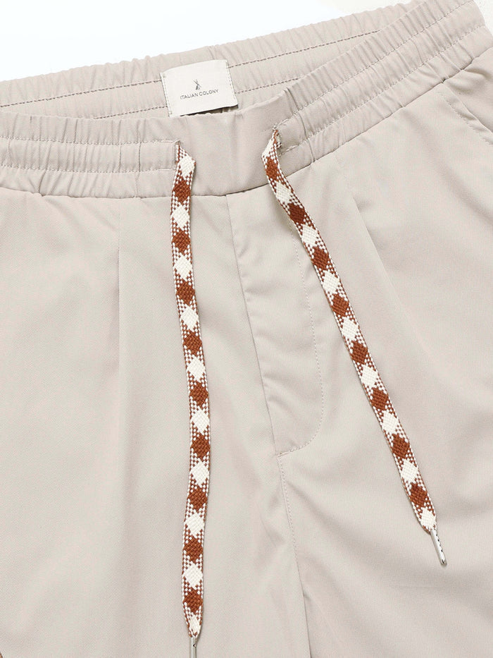 Cream Relaxed Fit Trousers for Men detail view - Flowstate Relaxed Trouser by Italian Colony