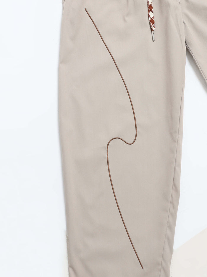 Cream Relaxed Fit Trousers for Men detail view - Flowstate Relaxed Trouser by Italian Colony