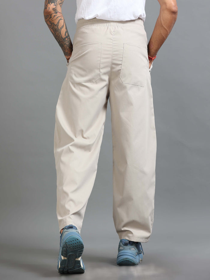 Cream Relaxed Fit Trousers for Men detail view - Flowstate Relaxed Trouser by Italian Colony