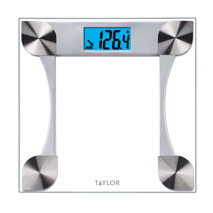 Glass digital bathroom scale with blue backlit display showing 126.4 lb