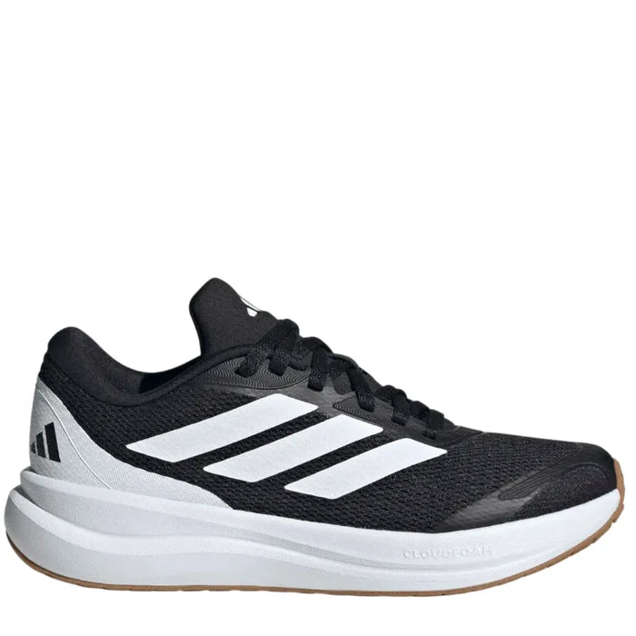 Black and white Adidas running shoe on a light gray background