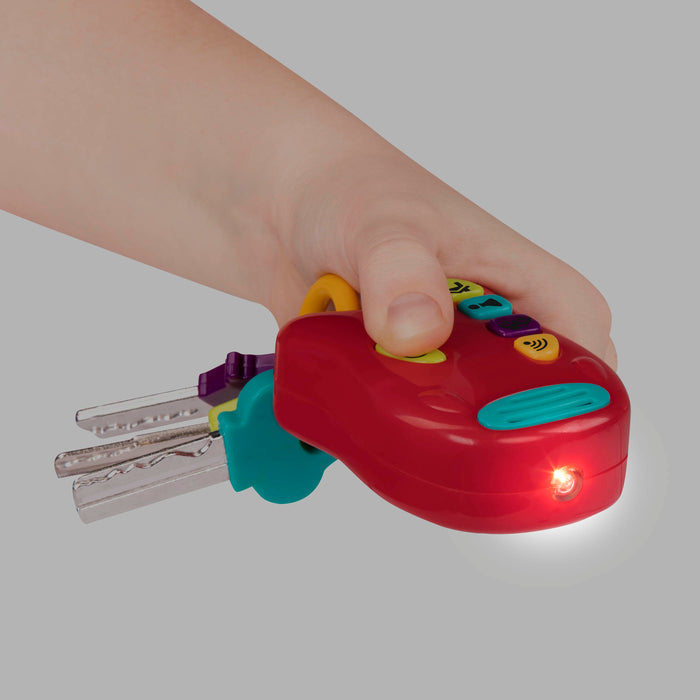 Red toy car keys.