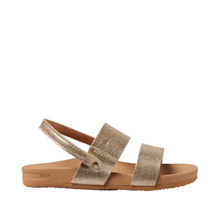 Gold sandal with a bow on a white background