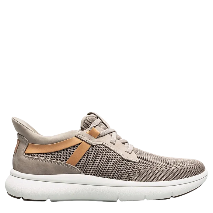 Gray sneaker with brown accents on a white background