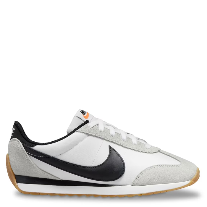 White sneaker with black swoosh logo on a white background