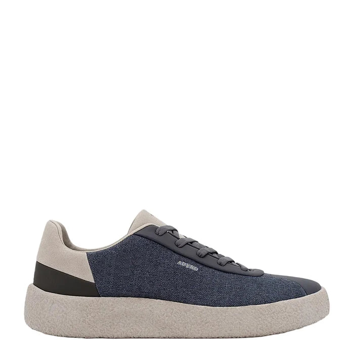 Navy and beige sneaker on a white background