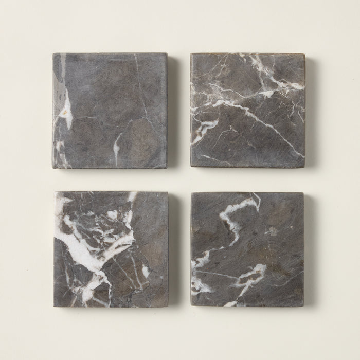 Set of ocean-inspired coasters with an artisanal design and organic texture.