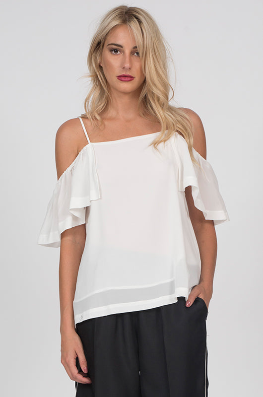 Model is wearing the Off-Shoulder Silk Cami Top in dove, with the Silk Twill Piping Pants in black.