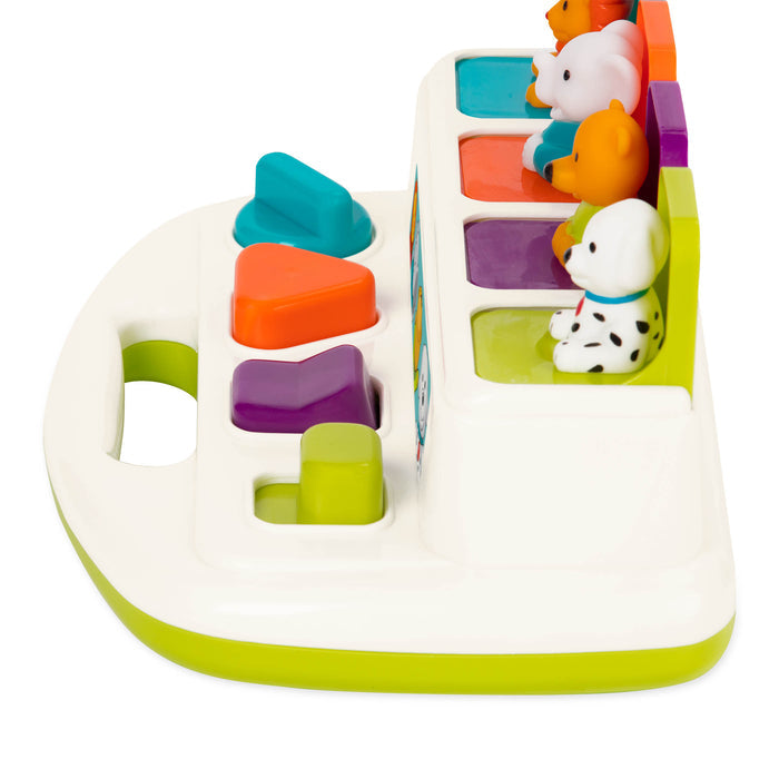 A pop up toy with 4 animals, a lion, elephant, bear, and dog.