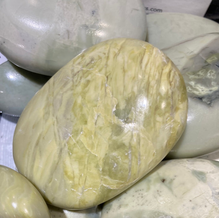 Serpentine palm stone