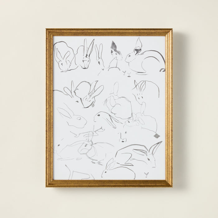 Vintage-inspired art print of sketched bunnies on a stretched canvas, featuring a distressed and aged patina.