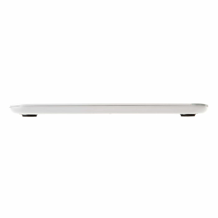 Side view of slim white digital kitchen scale showing UNIT and TARE buttons on the front