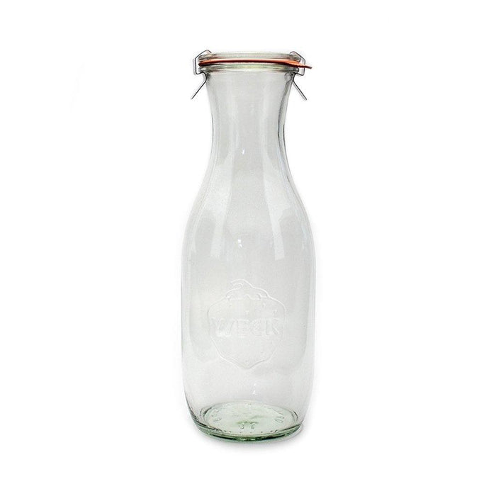 Glass Weck Juice Jar carafe with glass lid and clamps on white background
